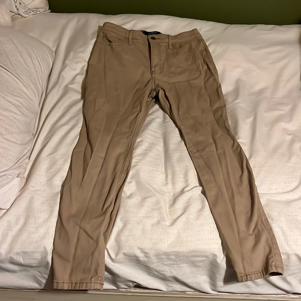 Khaki high-rise skinny jeans.